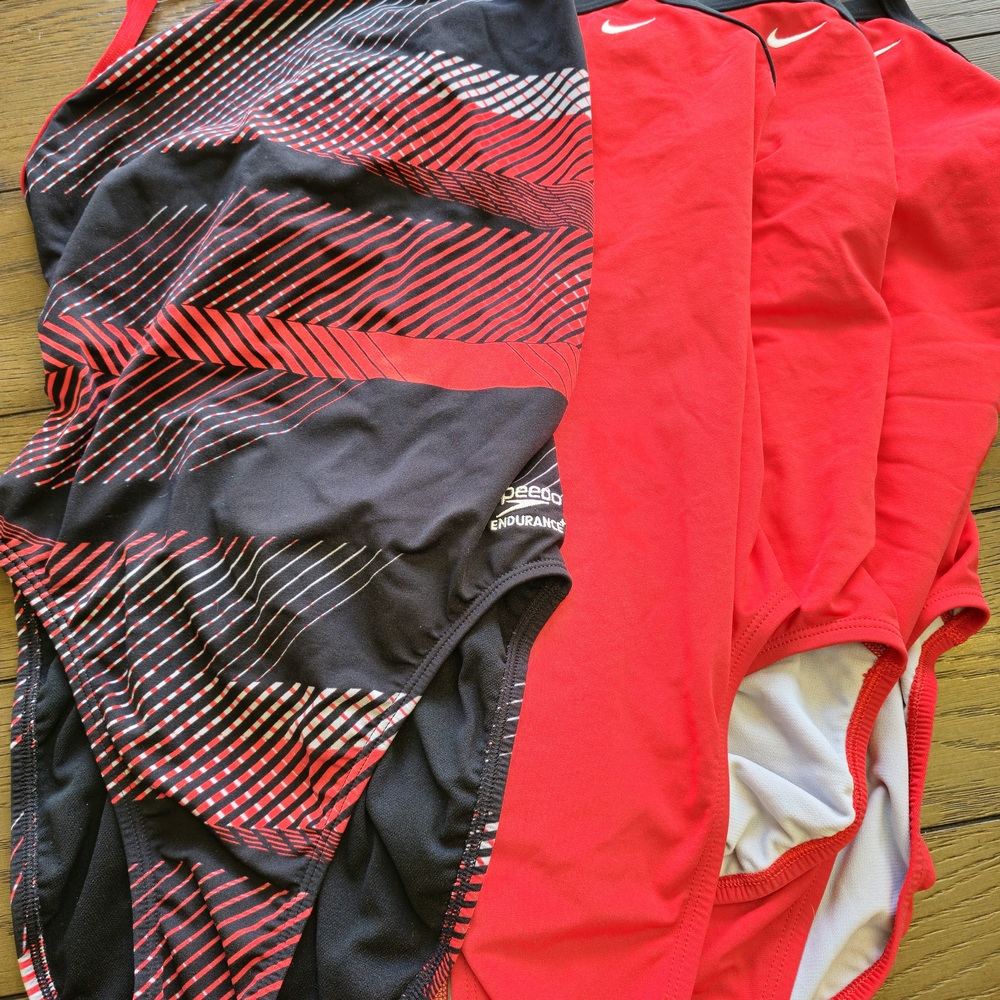 Speedo Dynamic Red and Black Swim & 3 Red Nike Suits